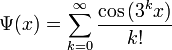 \Psi(x)=\sum \limits_{k=0}^\infty \frac{\cos{(3^kx)}}{k!}